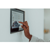 African woman using a smart home screen control system. High-quality photo