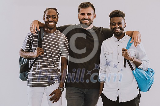 A photo of a group of happy students isolated on white background. High-quality photo A photo of a group of happy students isolated on white background. High-quality photo