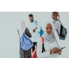 African female student with a group of friends in the background wearing traditional Islamic hijab clothes. Selective focus. High-quality photo