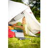 Cell phone charging with a solar charger in a tent during an outdoor trip