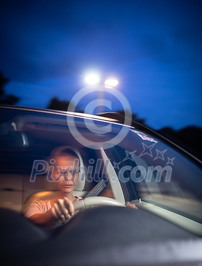Young female driver at the wheel of her car, super tired, falling asleep while driving in a potentially dangerous situation - Road safety concept Young female driver at the wheel of her car, super tired, falling asleep while driving in a potentially dangerous situation - Road safety concept