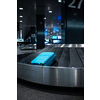Luggage on the luggage claim conveyor belt at an international airport