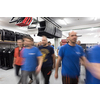 Blurred movement of workers in the modern heavy industry while doing the jobs they are in charge of. Blurred photo. Selective focus. High-quality photo
