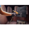 The painter paints the iron element. Industrial painting parts. Metal designs. High-quality photo