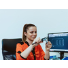 Within the heavy industry, a factory industrial engineer measures with a caliper and on a personal computer Designs a 3D model. High quality photo