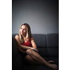 Depressed mid-aged woman at home feeling sad, lonely, anxious (color toned image)