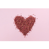 Dried red rose petals in shape of heart on toned background, flat lay with place for text. Minimal Valentine's day card design.