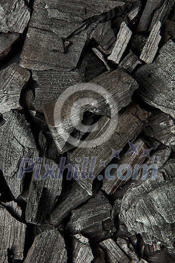 Close up of rough black coal background. Dark grungy material used in winter for fire. Natural abstract backdrop. Close up of rough black coal background. Dark grungy material used in winter for fire. Natural abstract backdrop.