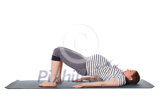 Pregnancy yoga exercise - pregnant woman doing yoga asana Purvottanasana Upward Plank Pose isolated on white background Pregnancy yoga exercise - pregnant woman doing yoga asana Purvottanasana Upward Plank Pose isolated on white background