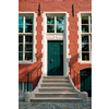 Brugge door with doorstep and window of an old Eurupean house. Bruges, Belgium