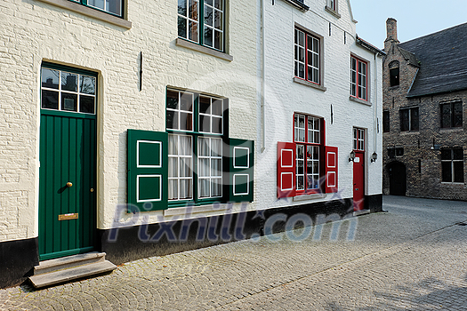 Door and window of an old house and street, Bruges (Brugge), Belgium Door and window of an old house and street, Bruges (Brugge), Belgium