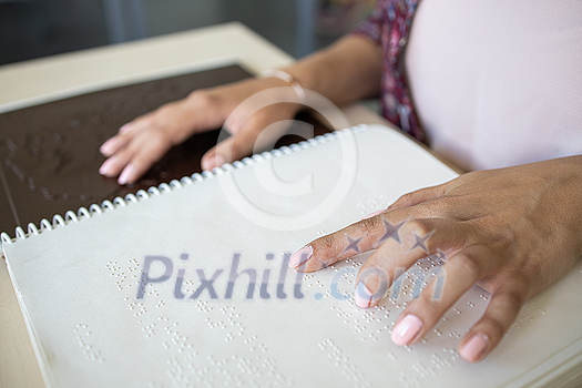 People with impaired vision using tactile maps, 3D models of town centres, landmarks, streets