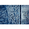 Aerial image of a winter landscape, winter forest trees covered with frost and snow (color toned image)