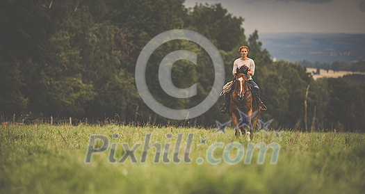 Pretty, young, redhead woman with her lovely horse, during her favorite leisure Pretty, young, redhead woman with her lovely horse, during her favorite leisure
