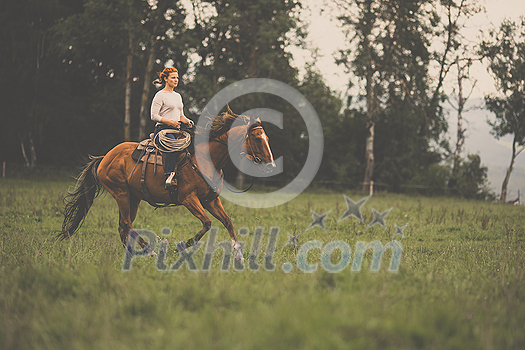 Pretty, young, redhead woman with her lovely horse, during her favorite leisure Pretty, young, redhead woman with her lovely horse, during her favorite leisure