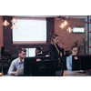Business people team experienced in work on business project training coaching man coworker, pleasant lady qualified consultant advisor assisting male client customer at the computer.High quality photo