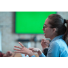 Successful team. Group of young multi-ethnic business people working and communicating together in creative office. Selective focus. High-quality photo
