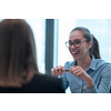 Successful team. Group of young multi-ethnic business people working and communicating together in creative office. Selective focus. High-quality photo