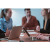 Successful team. Group of young multi-ethnic business people working and communicating together in creative office. Selective focus. High-quality photo