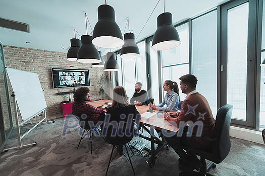 Successful team. Group of young multi-ethnic business people working and communicating together in creative office. Selective focus. High-quality photo Successful team. Group of young multi-ethnic business people working and communicating together in creative office. Selective focus. High-quality photo