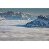 Splendid apline scenery. High mountains with fog and lovely evening light.