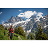 Pretty, female hiker/climber in a lovely alpine setting of Swiss Alps