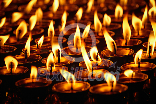 Burning candles in Buddhist temple. Dharamsala, Himachal Pradesh, India Burning candles in Buddhist temple. Dharamsala, Himachal Pradesh, India