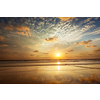 Sunset with dramatic sky on Baga beach. Goa, India