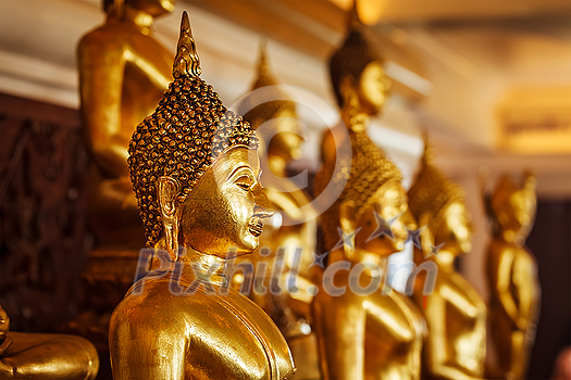 Golden Buddha statues in buddhist temple Wat Saket (The Golden Mount), Bangkok, Thailand Golden Buddha statues in buddhist temple Wat Saket (The Golden Mount), Bangkok, Thailand