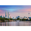 KUALA LUMPUR, MALAYSIA - JUNE 19, 2011: Kuala Lumpur skyline with Petronas Twin Towers skyscrapers on sunset. View over Titiwangsa Lake. Kuala Lumpur, Malaysia