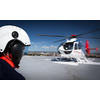 Modern medical helicopter on a hospital rooftop helipad