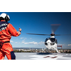 Modern medical helicopter on a hospital rooftop helipad