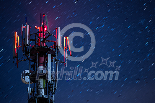 Telecommunication towers with 5G cellular network antennas on nature background, big digital data concept Telecommunication towers with 5G cellular network antennas on nature background, big digital data concept