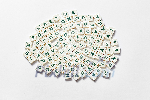 Scrabble tiles bundle on white background with copy space. Creative web template design. Scrabble tiles bundle on white background with copy space. Creative web template design.
