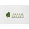 Green energy words formed of scrabble tiles with green tree leaf on white background. Nature and renewable energy concept.