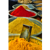 Turmeric curcuma powder and chili powder in spices market in India. Sardar Market, Jodhpur, Rajasthan, India