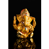 Ganesha statue isolated on black background with reflection