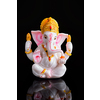Ganesha statue isolated on black background with reflection