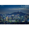 Seoul downtown cityscape illuminated with lights and Namsan Seoul Tower in the evening view from Inwang mountain. Seoul, South Korea.