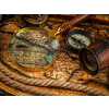 Travel geography navigation concept background - old vintage retro compass with sundial, spyglass and rope on ancient world map
