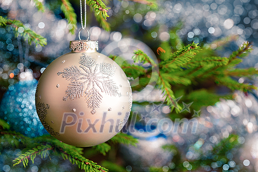 Christmas celebration holiday background - christmas-tree decoration bauble on decorated Christmas tree with defocused blurred lights bokeh and copyspalce Christmas celebration holiday background - christmas-tree decoration bauble on decorated Christmas tree with defocused blurred lights bokeh and copyspalce