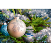 Christmas celebration holiday background - christmas-tree decoration bauble on decorated Christmas tree with defocused blurred lights bokeh and copyspalce