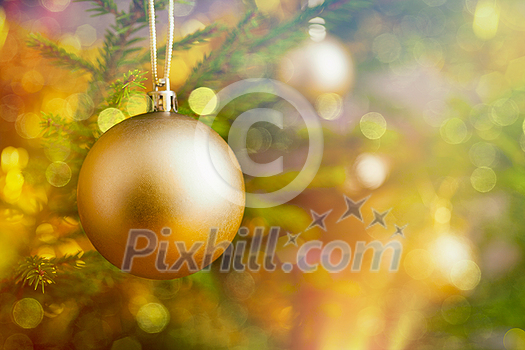 Christmas celebration holiday background - christmas-tree decoration bauble on decorated Christmas tree with defocused blurred lights bokeh and copyspalce