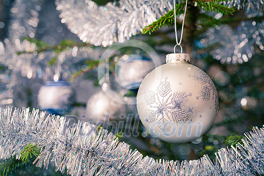 Christmas celebration holiday background - christmas-tree decoration bauble on decorated Christmas tree with defocused blurred lights bokeh and copyspalce Christmas celebration holiday background - christmas-tree decoration bauble on decorated Christmas tree with defocused blurred lights bokeh and copyspalce