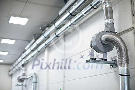 Air flow system in a modern building of a car workshop Air flow system in a modern building of a car workshop