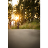 Happy couple riding bicycles outside, healthy lifestyle fun concept, taking a break admiring the view