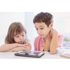 cute little brother and sister having fun at home childrends  playing games on tablet computer