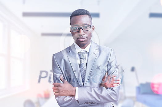 Portrait of young businessman in front of his modern office Portrait of young businessman in front of his modern office