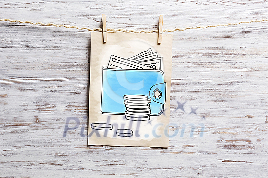 Paper sheet with sketches hanging on rope. Mixed media Paper sheet with sketches hanging on rope. Mixed media