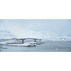 Fredvang bridges in heavy snowfall in winter. Lofoten islands, Norway